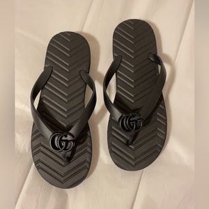 Black flip flops. Never worn.